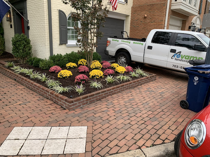 A white truck parked in front of a house